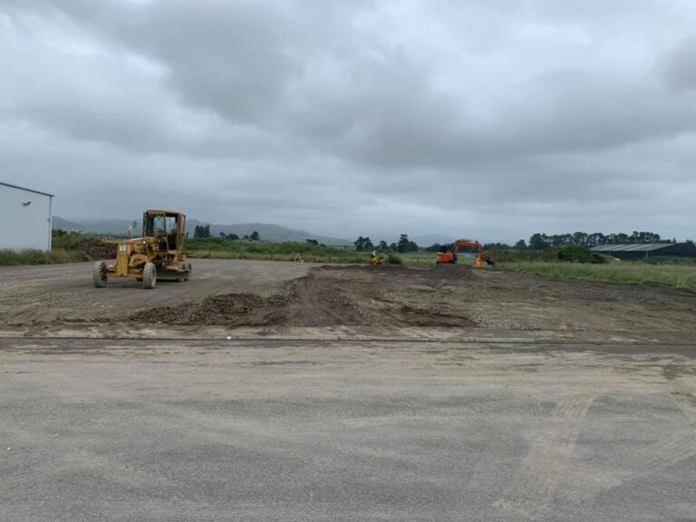 yellow digger on site